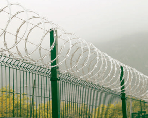 Installation of deals barbed wire fence